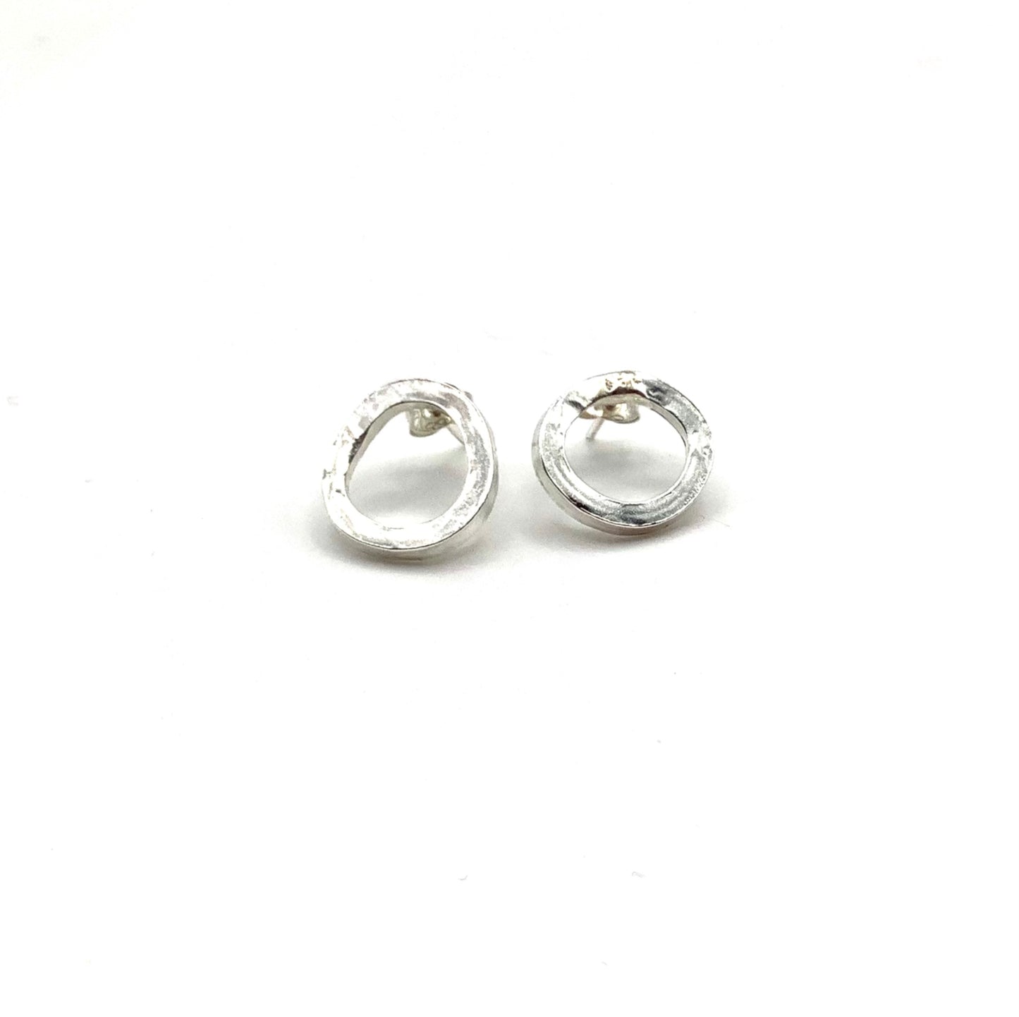 Sterling silver battered stud circles.