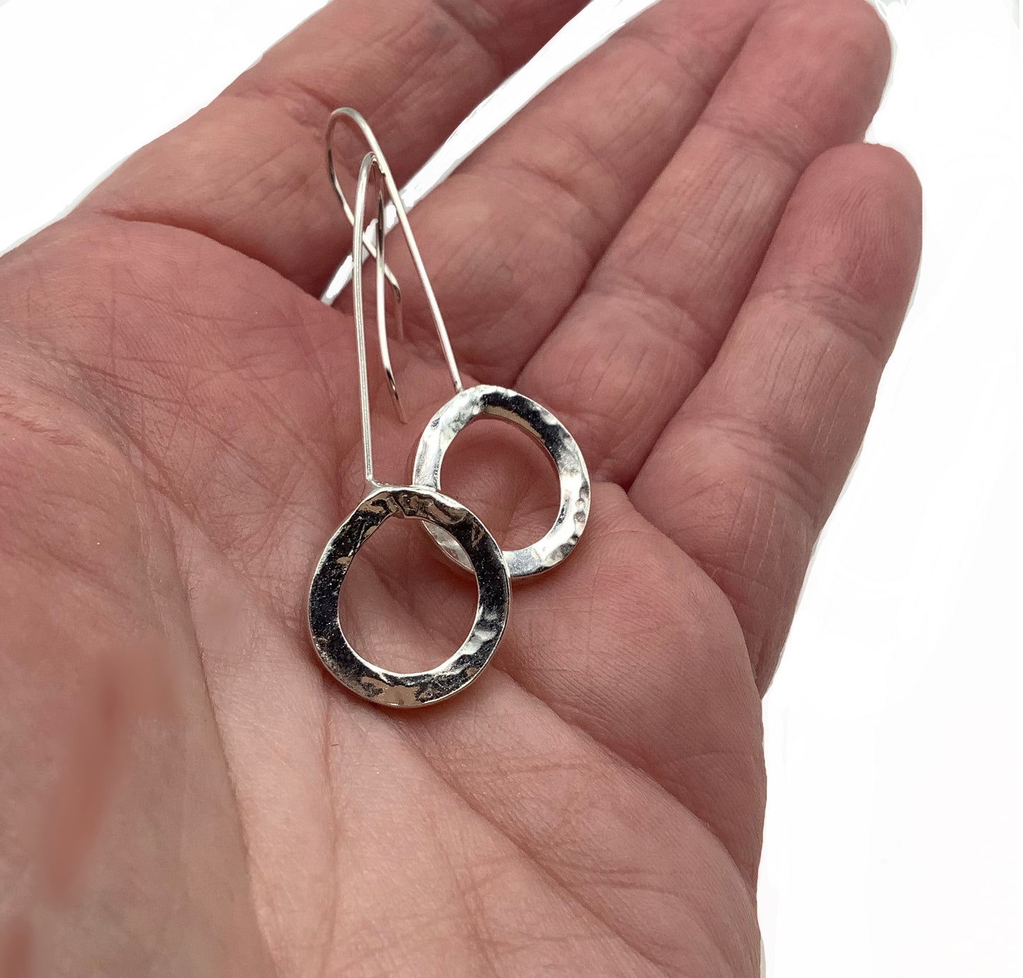 Sterling silver battered circle dangly earrings