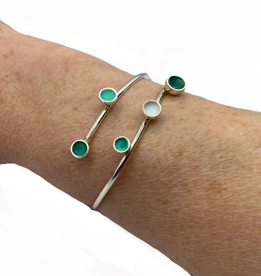 Sterling silver bangle with shades of viridian green and white enamel