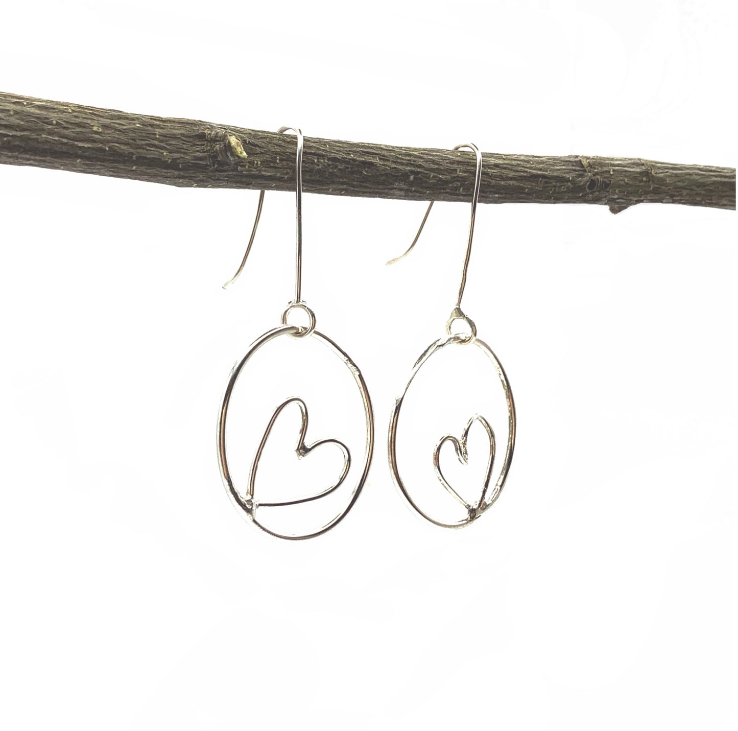 Sterling silver hoop earrings with hearts